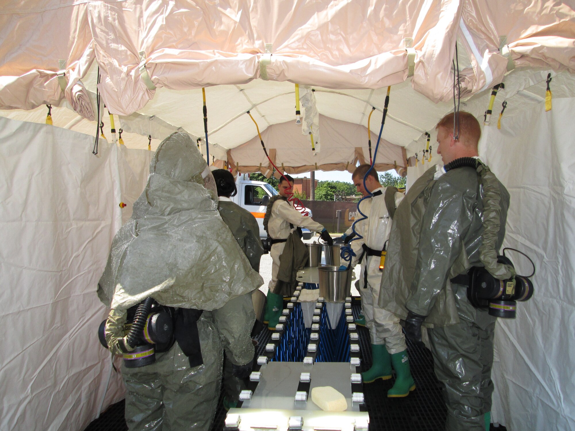 The 779th Medical Group Decontamination Team participates in the Chimera Exercise July 29, 2013 at Joint Base Andrews, Md. (U.S. Air Force photo)