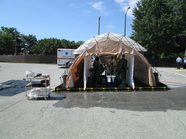 The 779th Medical Group Decontamination Team participates in the Chimera Exercise July 29, 2013 at Joint Base Andrews, Md. (U.S. Air Force photo)