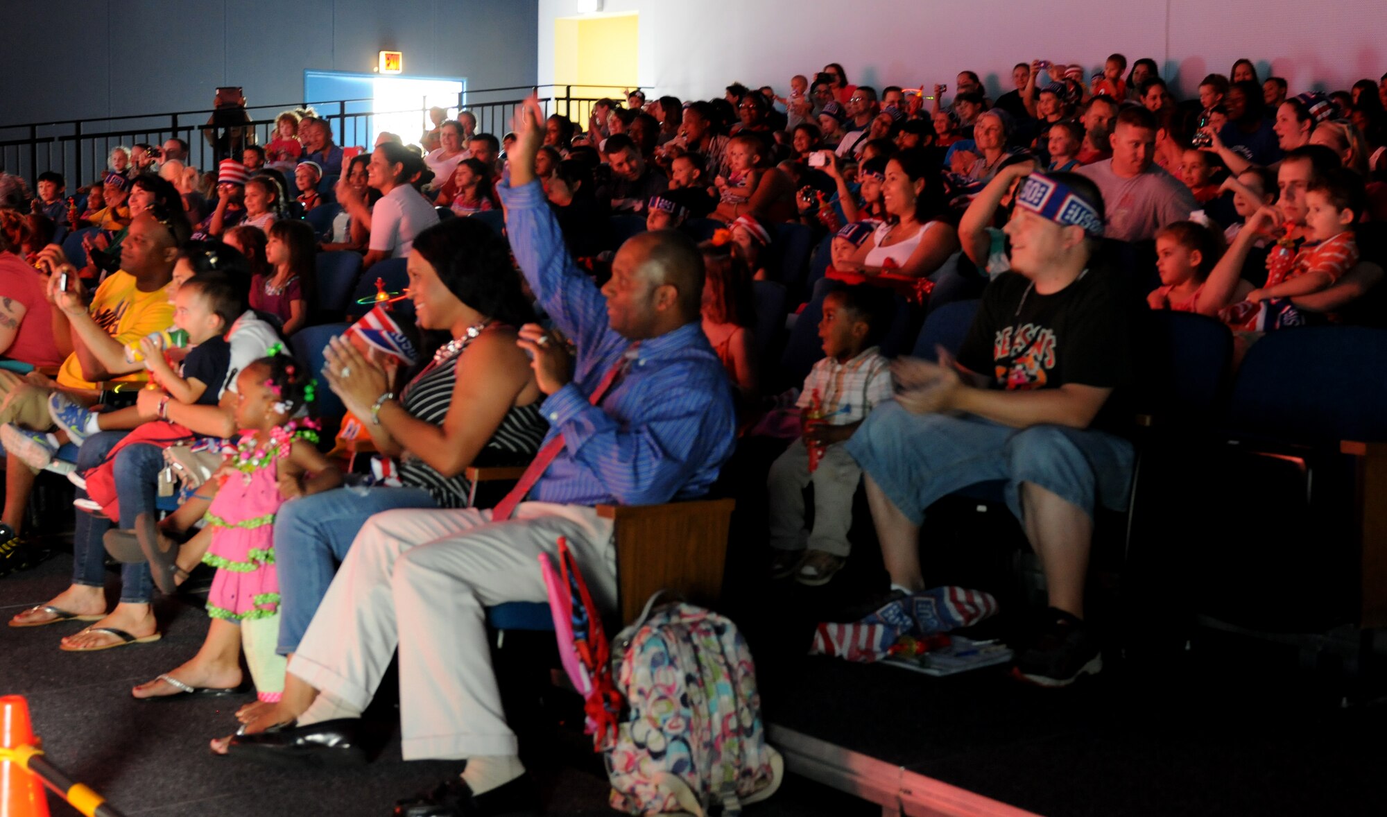 Members of the KMC enjoy “Sesame Street USO Experience for Military Families” show, July 24, 2013, Kleber Kaserne, Germany. Members of the show are traveling to U.S. military bases around the world in support of military members and their families. (U.S. Air Force photo/Airman 1st Class Holly Mansfield)