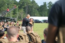 Midshipmen from the contramid program, get an overall MCMAP demonstration from Marine Corps Base Camp Geiger July 20.