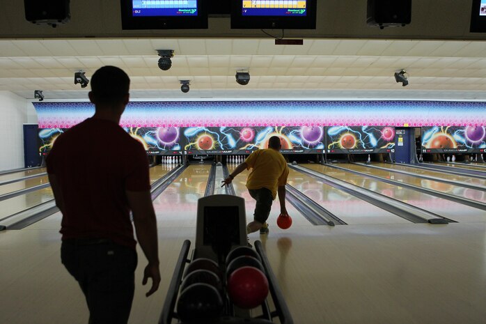 More than 30 Marines participated in the Headquarters and Headquarters Squadron 2013 Bowling Tournament at the air station bowling alley, July 25.