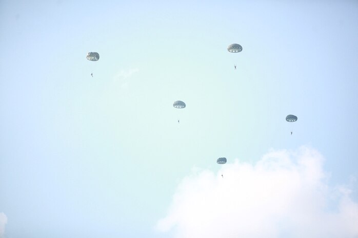 Marines from Marine Medium Tiltrotor Squadron 261 parachute from an MV-22B Osprey for parachute operations, July 25.