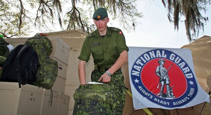 Pvt. Rene Andersen, a soldier in the Denmark Army, packs his gear during Vigilant Guard 2008, a disaster response training exercise based in Beaufort County, S.C. on April 18, 2008. Andersen and a contingent of 40 Danish soldiers are participating in the exercise as observers. Many of the Danes served alongside South Carolina National Guard Soldiers in 2007 in Afghanistan in support of the Global War on Terror.