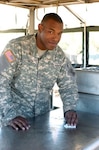 Pvt. George Green, a member of the 118th Mechanized Infantry of the South Carolina National Guard, prepares a mobile kitchen tent unit for use during Vigilant Guard SC, a disaster response preparedness exercise that brought together more than 2,000 National Guard Soldiers and Airmen to work with local, state and other federal authorities in Beaufort County, S.C. Green, a resident of Greenville, S.C., joined the National Guard in 2007.