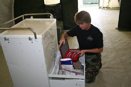 Staff Sgt. Doyse Manz, a surgical technician with the 190th Medical Group of the Kansas Air National Guard, unpacks medical equipment to be used during Vigilant Guard 2008, a disaster response training exercise based in Beaufort County, S.C., April 20, 2008. Vigilant Guard is one of the largest disaster response training exercises in the history of the National Guard, involving more than 3,000 Soldiers and Airmen from more than a dozen states.