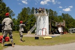 Members of the 877th Engineer Company from Augusta, Georgia receive high-angle extraction rescue techniques at the Burton Township Fire Department in Beaufort County, South Carolina. Andy Lancaster, a member of the Response International Group team from Oklahoma City, is the exercise coordinator. This scenario, in support of the Vigilant Guard 2008 exercise, is being conducted from 21-24 April 2008 in Beaufort County, S.C. Army and Air National Guard personnel from South Carolina and various other states are conducting an earthquake response exercise in coordination with local, state, and federal emergency agencies.