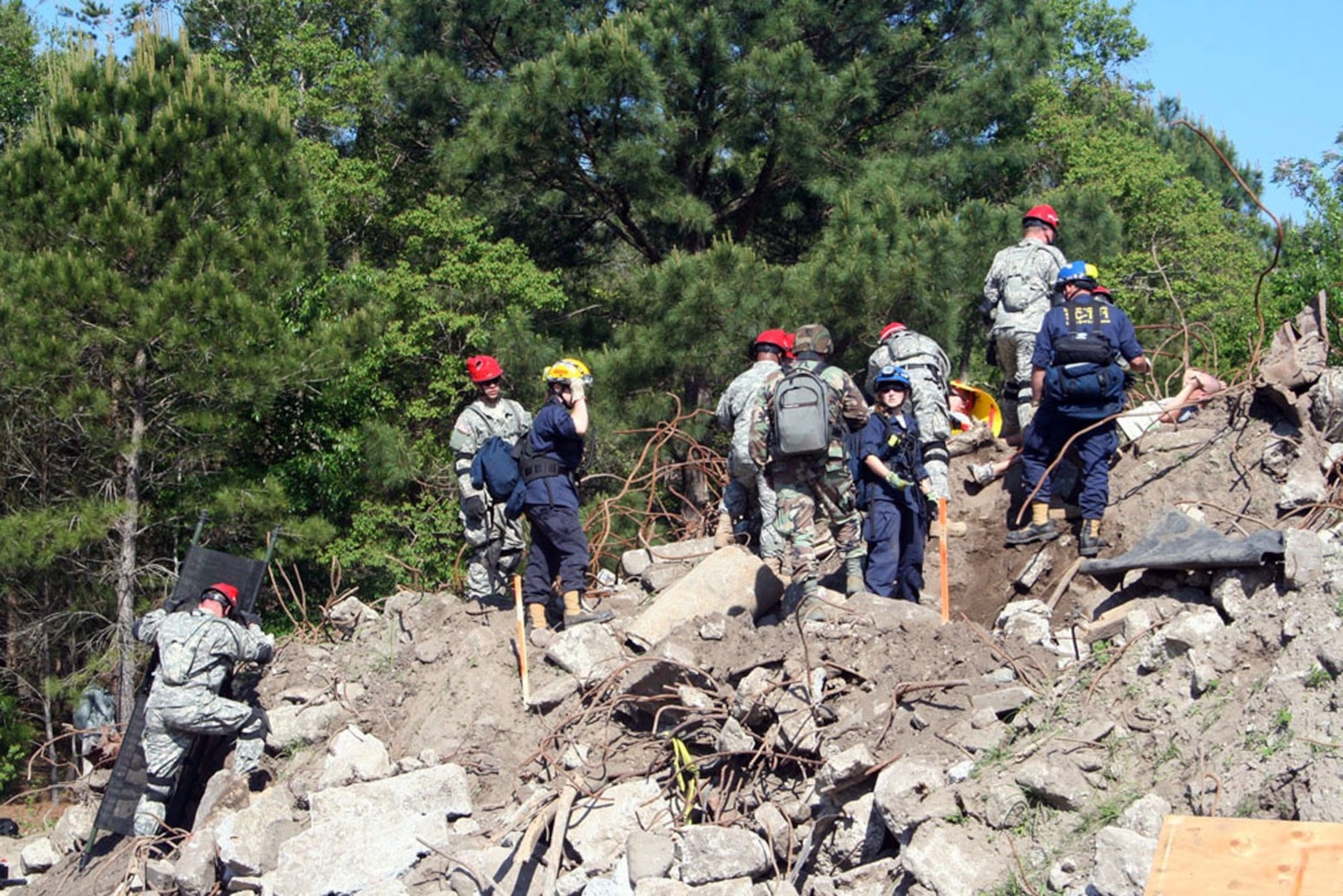 Rescue crews from the South Carolina National Guard work together to search for victims in the 'rubble pile' at the Vigilant Guard 2008 exercise in Beaufort, S.C.