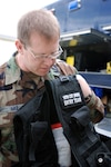 Tech. Sgt. Andrew Imke from the Washington National Guard 10th Weapons of Mass Destruction Civil Support Team reviews survey team equipment May 1 at Camp Murray, Wash. The state's CST is supporting emergency exercise scenarios for "National Level Exercise 2008." Their role as a first military responder is to support civil authorities in events known or suspected to involve the use of chemical, biological or radiological agents.