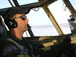 Maj. David Lafrance, a LC-130 Hercules pilot for the New York Air National Guard's 109th Airlift Wing, surveys a remote camp in Antarctica Nov. 4 before landing there to transport a critically injured Australian expeditioner to medical care. The Wing's citizen-Airmen flew more than 8.7 million pounds of cargo and 3,800 passengers during nearly 300 missions in support of the 2008-2009 Operation Deep Freeze season that ended Feb. 28.