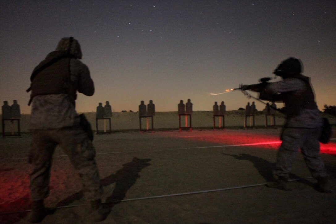 Marines with Bulk Fuel Company B, 6th Engineer Support Battalion, fire at targets during a live-fire range here, July 16. Bulk fuel Marines practiced setting up fueling positions and protecting those positions from notional enemy combatants. Marines responsible for guarding the fuel conducted a series of live-fire ranges to become more proficient with their service rifles and crew-served weapons. 