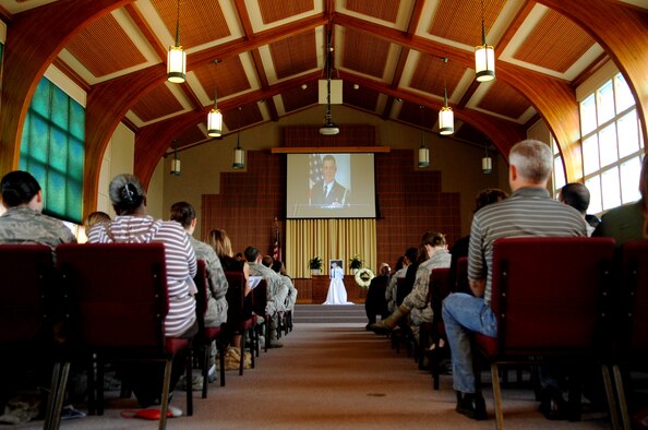 Grand Forks Air Force Base, N.D., community members gather July 30, 2013, at a memorial service for Tech. Sgt. Mathew Hullman, of the 319th Medical Operations Squadron. Hullman was declared dead following a shooting incident on July 21, and the incident remains under investigation.  (U.S. Air Force photo by Staff Sgt. Amanda N. Grabiec)