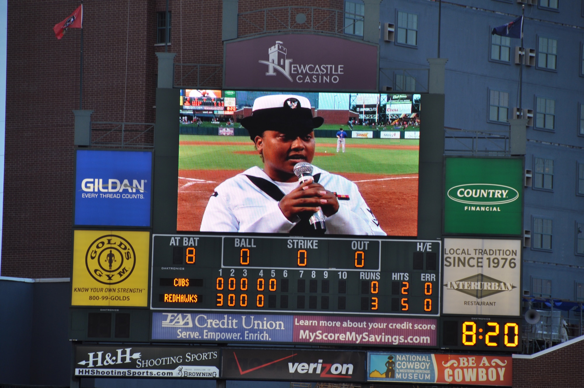 Navy Aviation Machinist Mate 3rd Class Trautyka Butler, VQ-7 sings “God Bless America” at the Oklahoma City RedHawks military appreciation game on July 27. (U.S. Air Force Photo/Maj. Jon Quinlan)