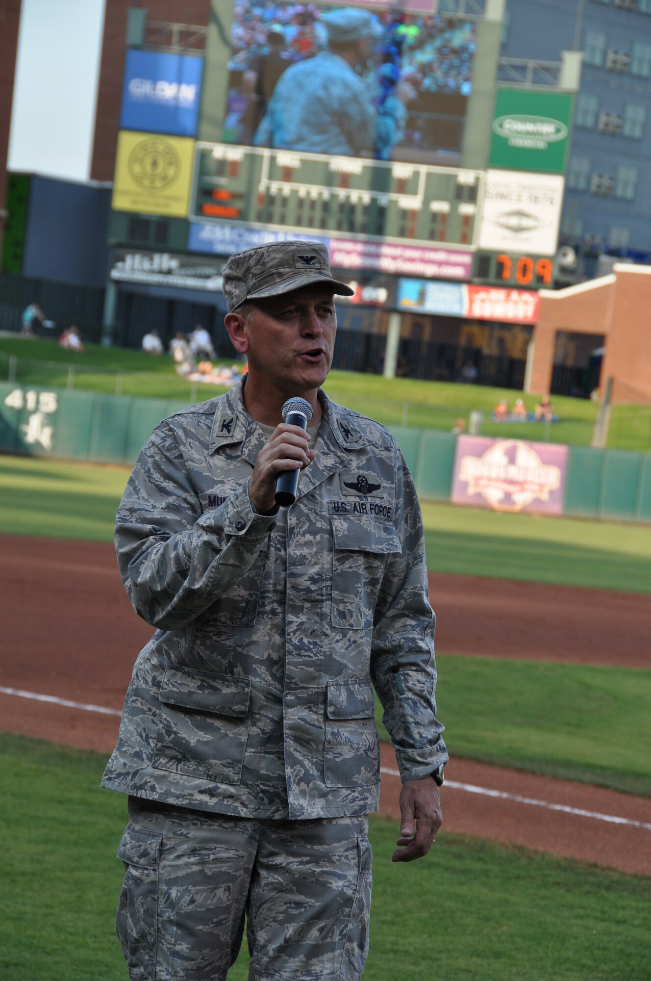 Colonel Russell Muncy, 507th Air Refueling Wing commander thanks the crowd and the Oklahoma City RedHawks for their support of the Guard and Reserve during the opening ceremony of the military appreciation game on July 27. The Oklahoma City RedHawks minor league baseball organization held its second hometown heroes celebration of the season to recognize local military members and their families. (U.S. Air Force Photo/Maj. Jon Quinlan)   