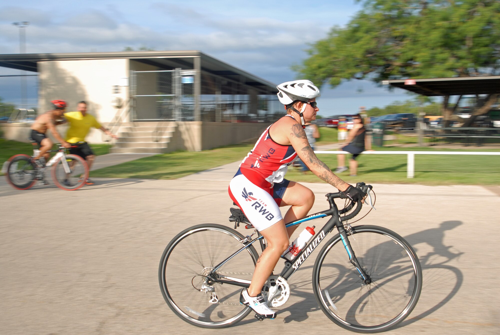SAN ANGELO, Texas – Army 1st Sgt. Annett Reed, 344th Military intelligence Battalion Charlie Company first sergeant, starts the bicycle ride leg of the 2013 Annual Triathlon at the Goodfellow Recreation Camp July 27. Cyclists start at the Rec Camp and ride 10-kilometers south to the South Concho River Bridge then proceed 10-kilometers back to the Rec Camp. (U.S. Air Force photo/ Airman 1st Class Breonna Veal)
