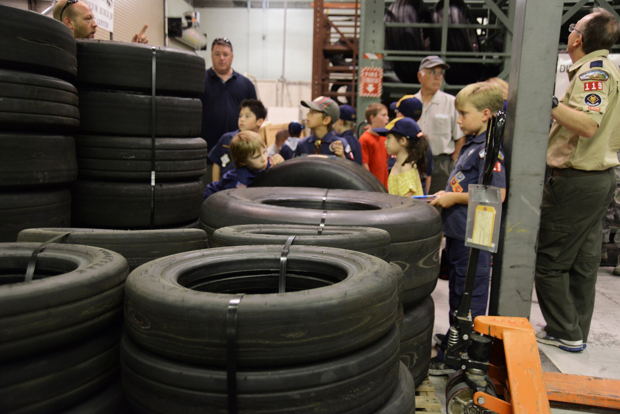 Cub Scout Pack 119 from Santa Clarita, Calif.,visits the tire shop at the 412th Maintenace Group building at Edwards AFB, Calif., July 26. (U.S. Air Force photo by Rebecca Amber)