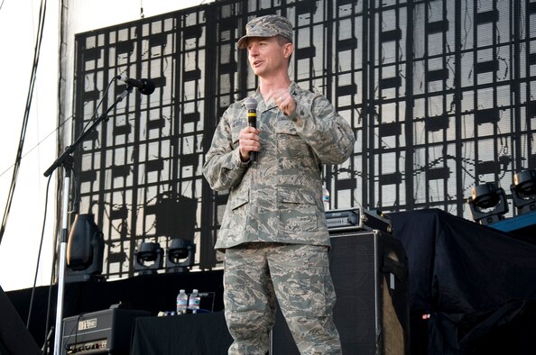 Col. Randall Huiss, 436th Airlift Wing vice commander, speaks to a crowd July 24, before a Dierks Bentley concert at the Delaware State Fair in Harrington Del. The speeches by the colonel and other military leaders capped Armed Forces day activities at the fair. (U.S. Air Force photo/Tech. Sgt. Jeremy Larlee)