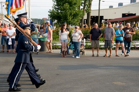 Members of the Dover Air Force Base honor guard march in a parade July 24, as part of Armed Forces Day at the Delaware State Fairgrounds in Harrington, Del. The honor guard led the parade that also included a formation of Team Dover Airmen and a band from the Delaware National Guard. (U.S. Air Force photo/Tech. Sgt. Jeremy Larlee)