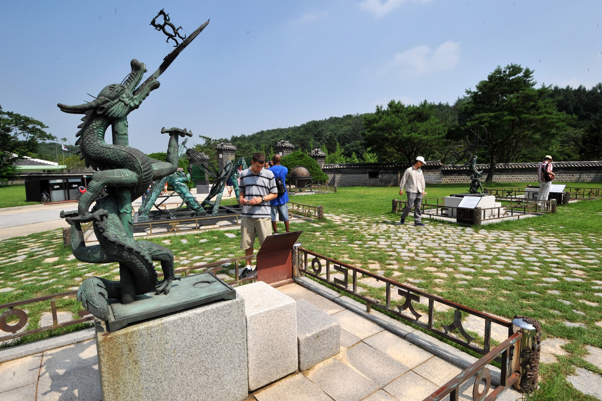 Participants in the Yeoju cultural tour view replicas of inventions that were commissioned by King Sejong during the Yeoju culture tour at King Sejong’s tomb in the Gyeonggi Province, Republic of Korea,  July 26, 2013.  King Sejong commissioned many inventions such as water clocks, armillary spheres, sundials and rain gauge. (U.S. Air Force photo/Staff Sgt. Emerson Nuñez)