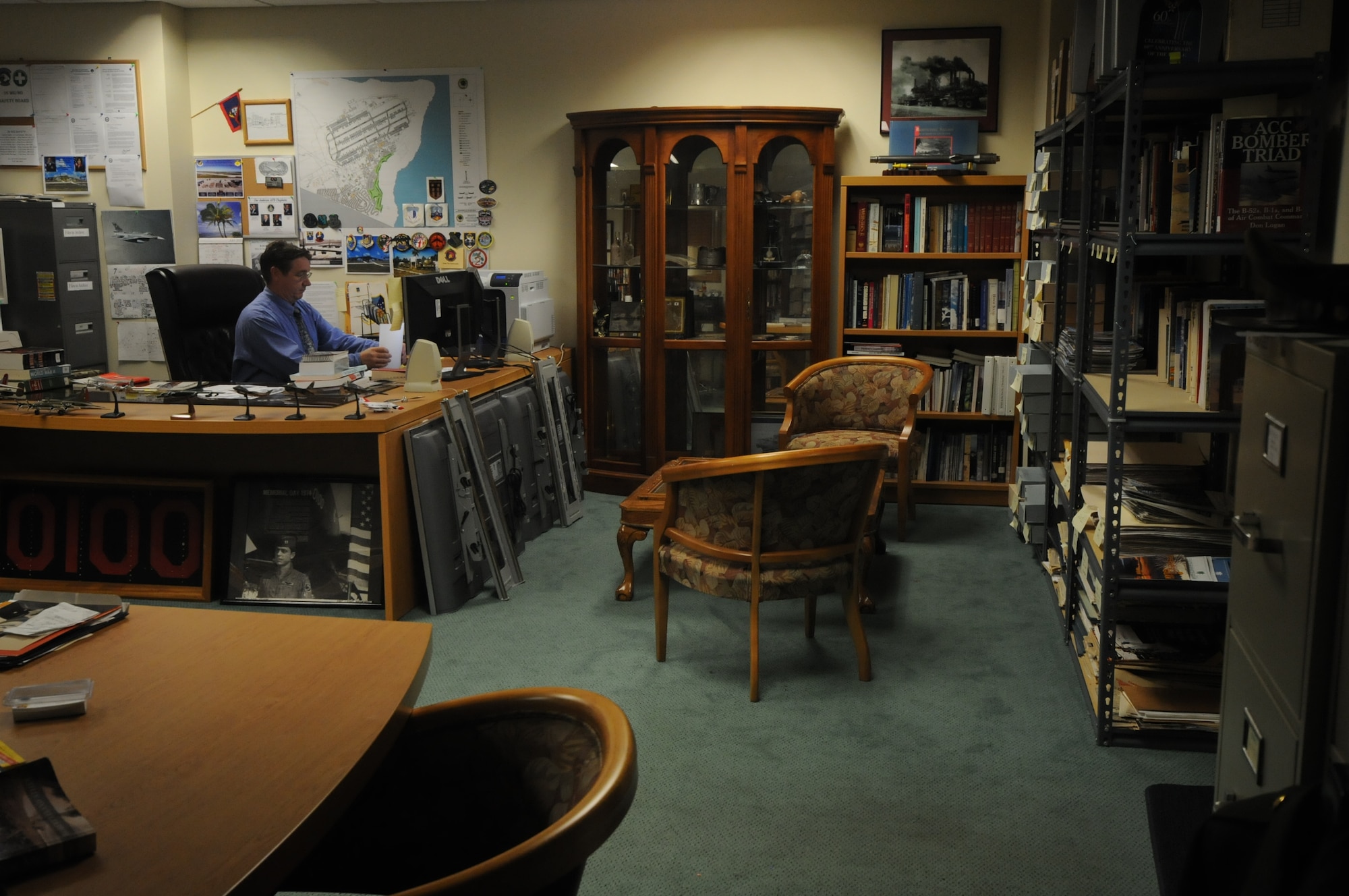 Jeffrey Meyer, 36th Wing Historian, researches past events for Andersen Air Force Base, Guam July 30, 2013, here. Historians preserve documents and write about the responsibilities of a wing so researchers can make predictions for future operations, construction and manning. (U.S. Air Force photo by Airman 1st Class Amanda Morris/Released)