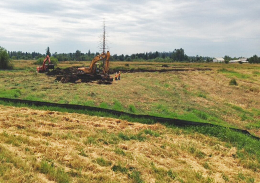 Construction to Big Spring Creek began July 1 and relocates the current ditched system into a channel consistent with its historic route. This restoration effort will reduce pollution coming from roadside ditches, restore native vegetation, and improve fish and wildlife habitat, including coho salmon and cutthroat trout.   Currently, very little native vegetation or instream habitat features are associated with the stream. 