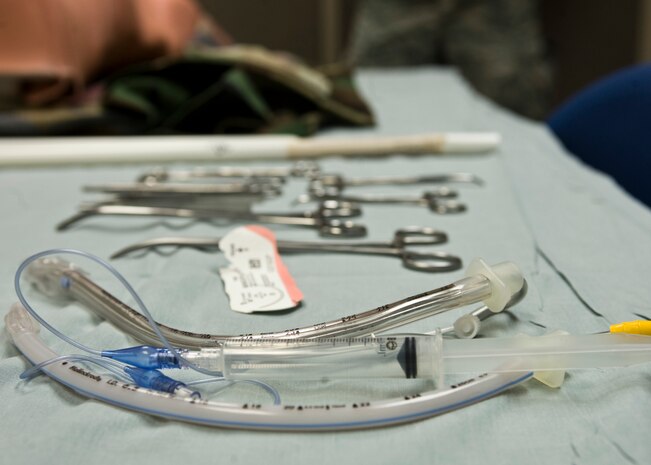Airmen use Endotracheal tubes during medical training July 25, 2013, at Nellis Air Force Base, Nev. A tracheal tube is inserted into the trachea for the primary purpose of establishing and maintaining a patient’s airway and to ensure the adequate exchange of oxygen and carbon dioxide. (U.S. Air Force Photo by Airman 1st Class Jason Couillard)