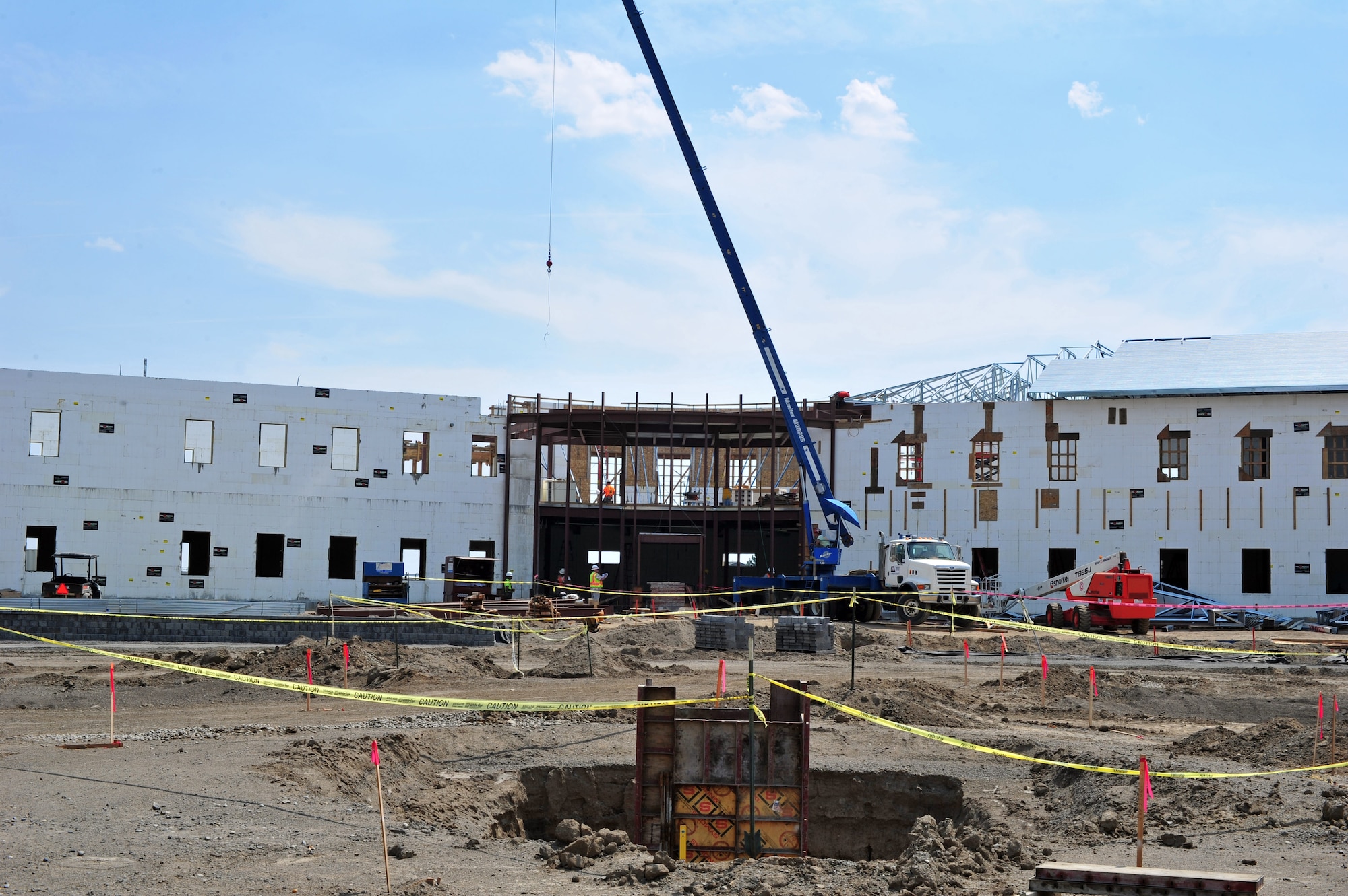 An overall image of the construction site progress for the new wing headquarters building at Fairchild Air Force Base, Wash., July 30th, 2013. (U.S. Air Force photo by Senior Airman Taylor Curry/Released)