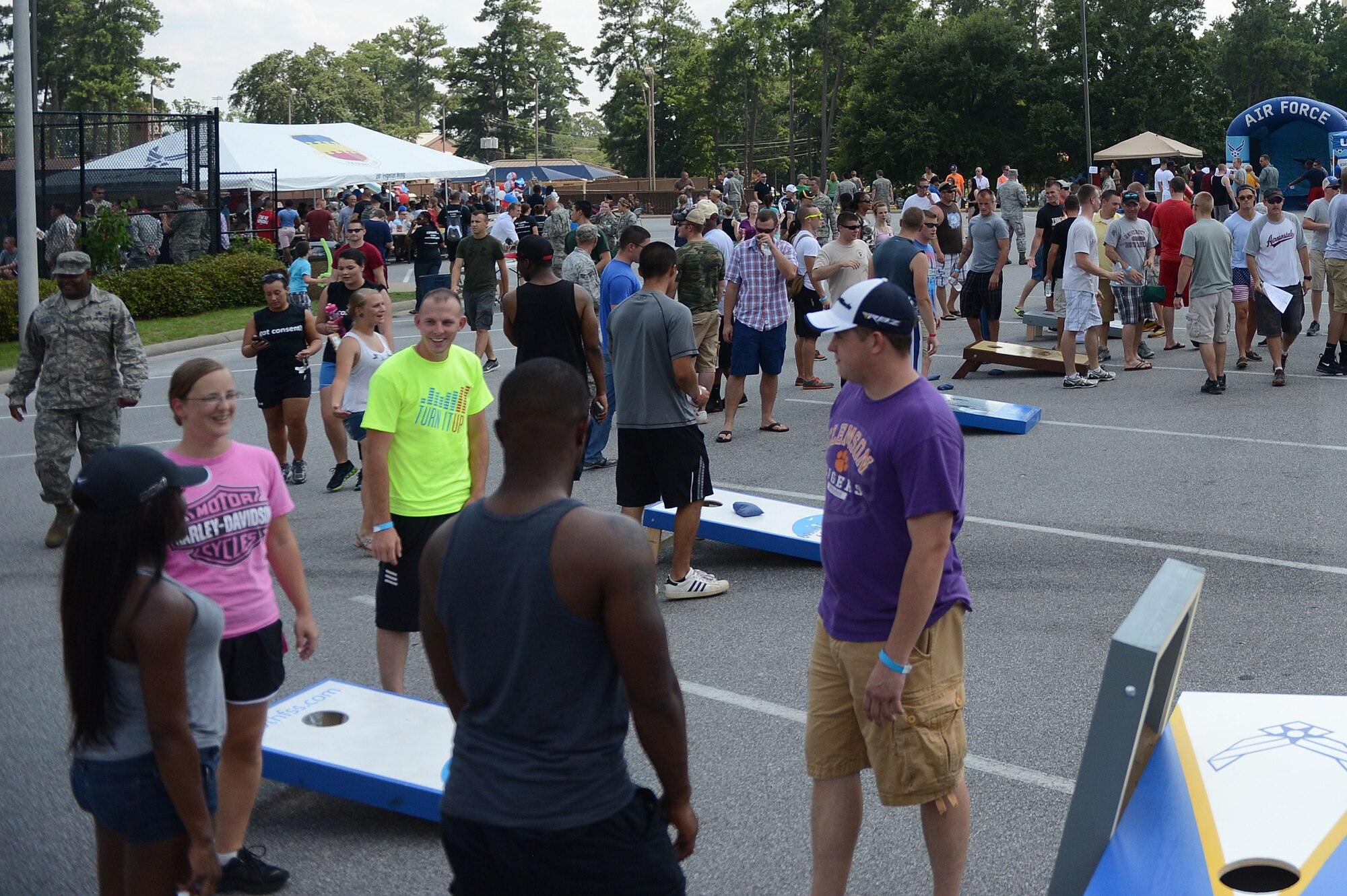 Team Shaw service members attend the Junior Enlisted Appreciation Day celebration at Shaw Air Force Base, S.C., July 26, 2013. Shaw’s JEAD honored the work of Airmen and Soldiers, grades E-1 to E-5, for their role in supporting the bases’ missions and daily operations. (U.S. Air Force photo by Airman 1st Class Daniel Blackwell/Released)