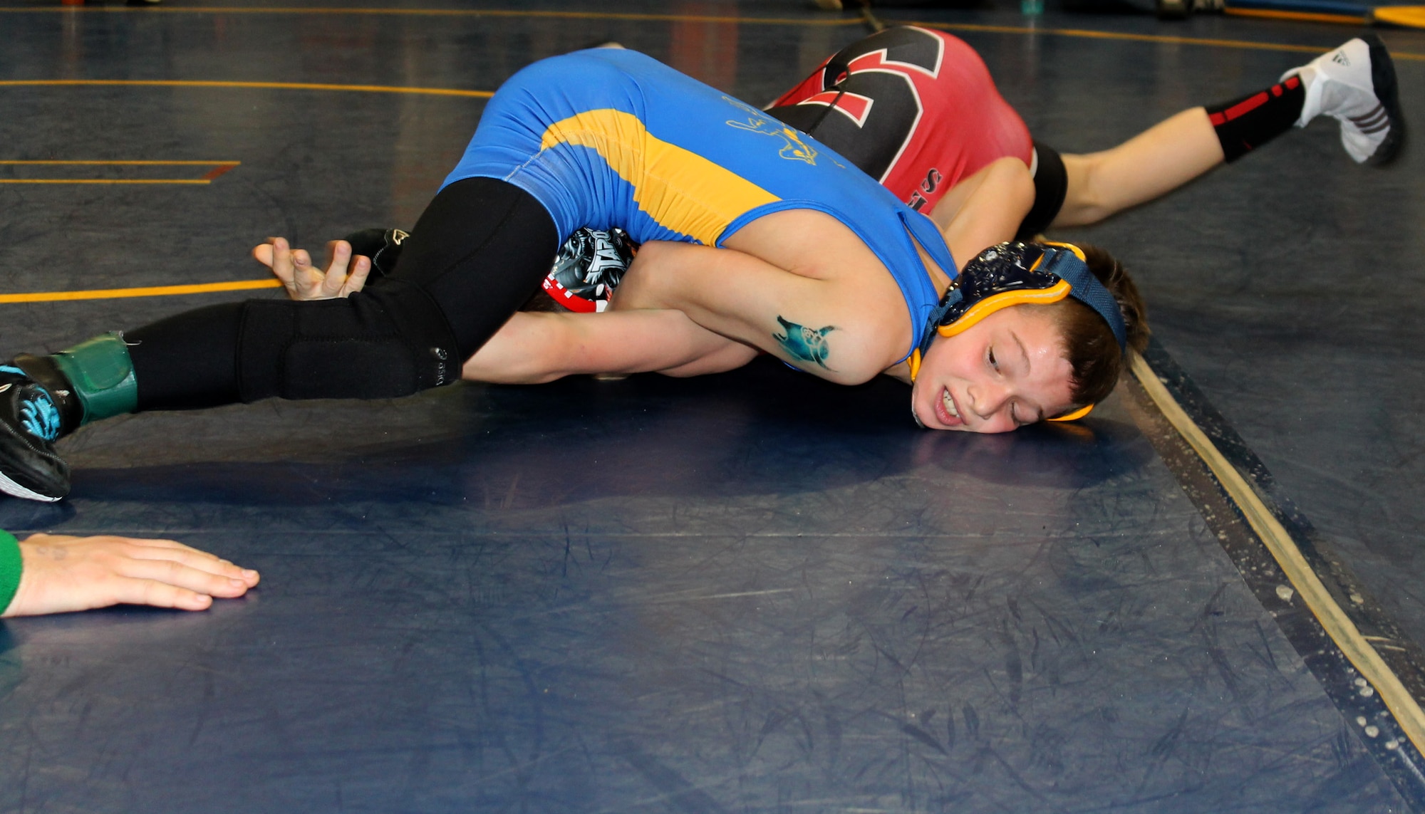 Francis Morrisey applies his favorite wrestling move, the arm bar hook, to an opponent in a match during the Caesar Rodney Rough Rider tournament March 2, 2013, at Caesar Rodney High School in Camden, Del. Morrisey, who won the Eastern Nationals Wrestling Championship in May, finished 2013 season with a 134-17 record winning 38 tournaments. (Courtesy photo)