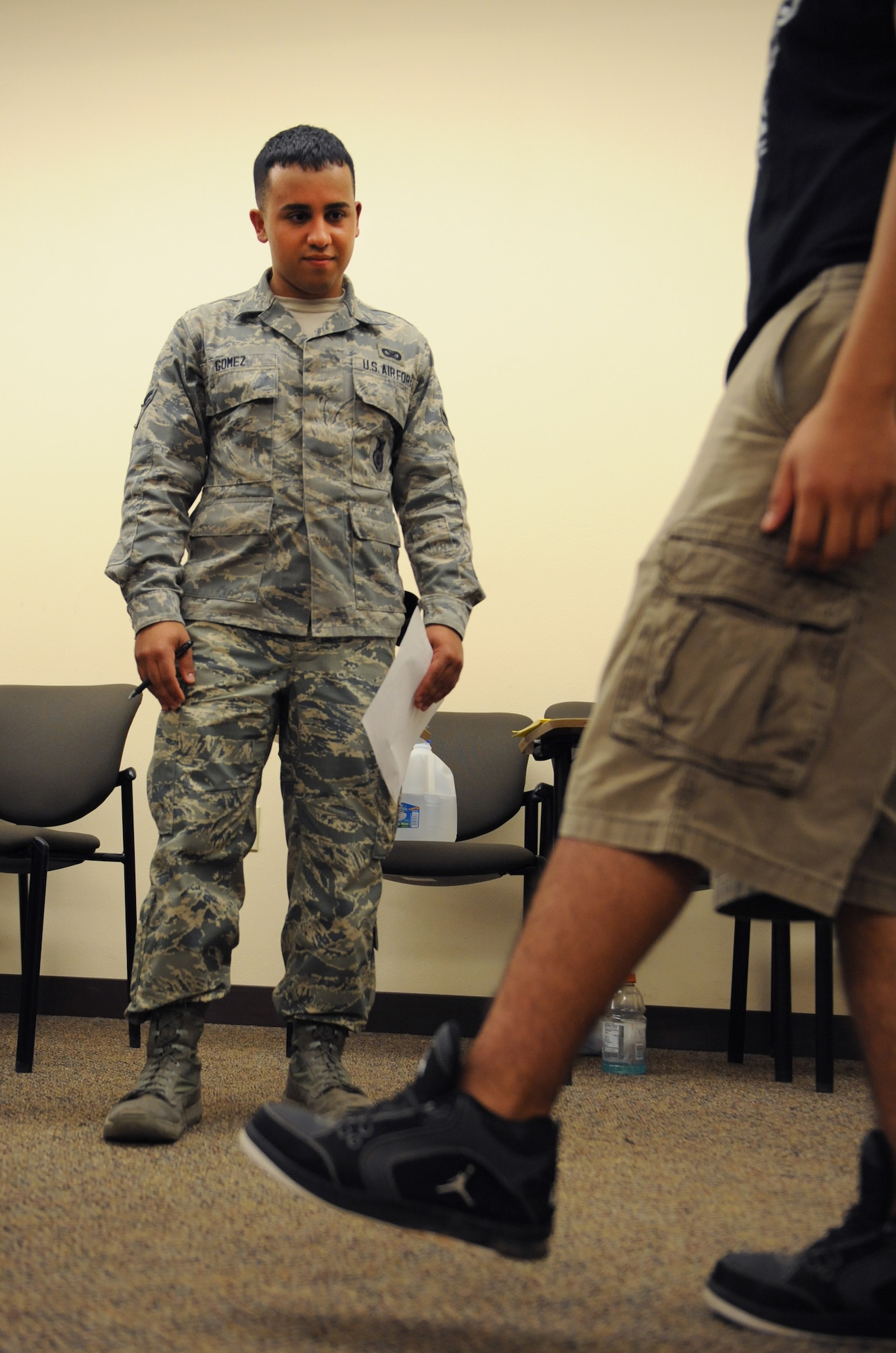 Airman 1st Class Caleb Gomez, 2nd Security Forces Squadron patrolman, watches a participant lift his leg during standardized field sobriety test training on Barksdale Air Force Base, La., July 24, 2013. When conducting the one-legged stand, officers look for swaying, hopping, the use of arms to balance and the individual putting their foot down before deciding to apprehend an individual. (U.S. Air Force photo/Airman 1st Class Benjamin Gonsier)

