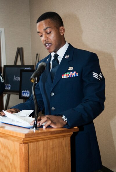 U.S. Air Force Senior Airman Dominique Castillo, 23d Force Support Squadron food services specialist, speaks at a senior NCO induction ceremony at Moody Air Force Base, Ga. July 26, 2013. Castillo emphasized the importance master sergeants played in his career. (U.S. Air Force photo by Airman 1st Class Sandra Marrero/released)