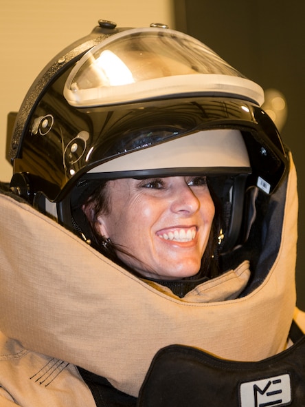 Crissy Staley, 23d Wing command chief honorary commander, wears the EOD 9 bomb suit during immersion day at Moody Air Force Base, Ga., July 26, 2013. The bomb suit is used by EOD members to manually diffuse a bomb when a robot is incapable of doing so. (U.S. Air Force photo by Senior Airman Douglas Ellis/Released)
