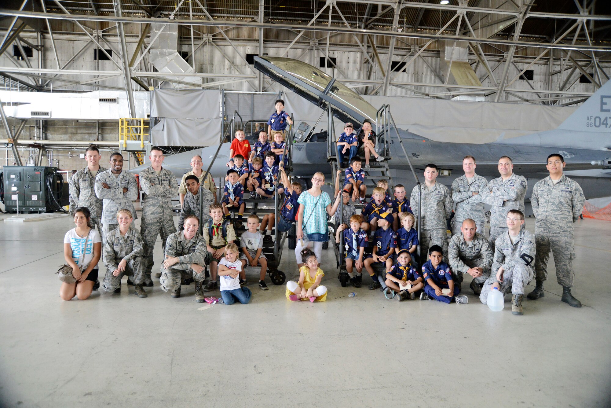 Cub Scouts from Pack 119 pose for a photo with F-16 Shadow Fleet maintainers July 26. (U.S. Air Force photo by Rebecca Amber)