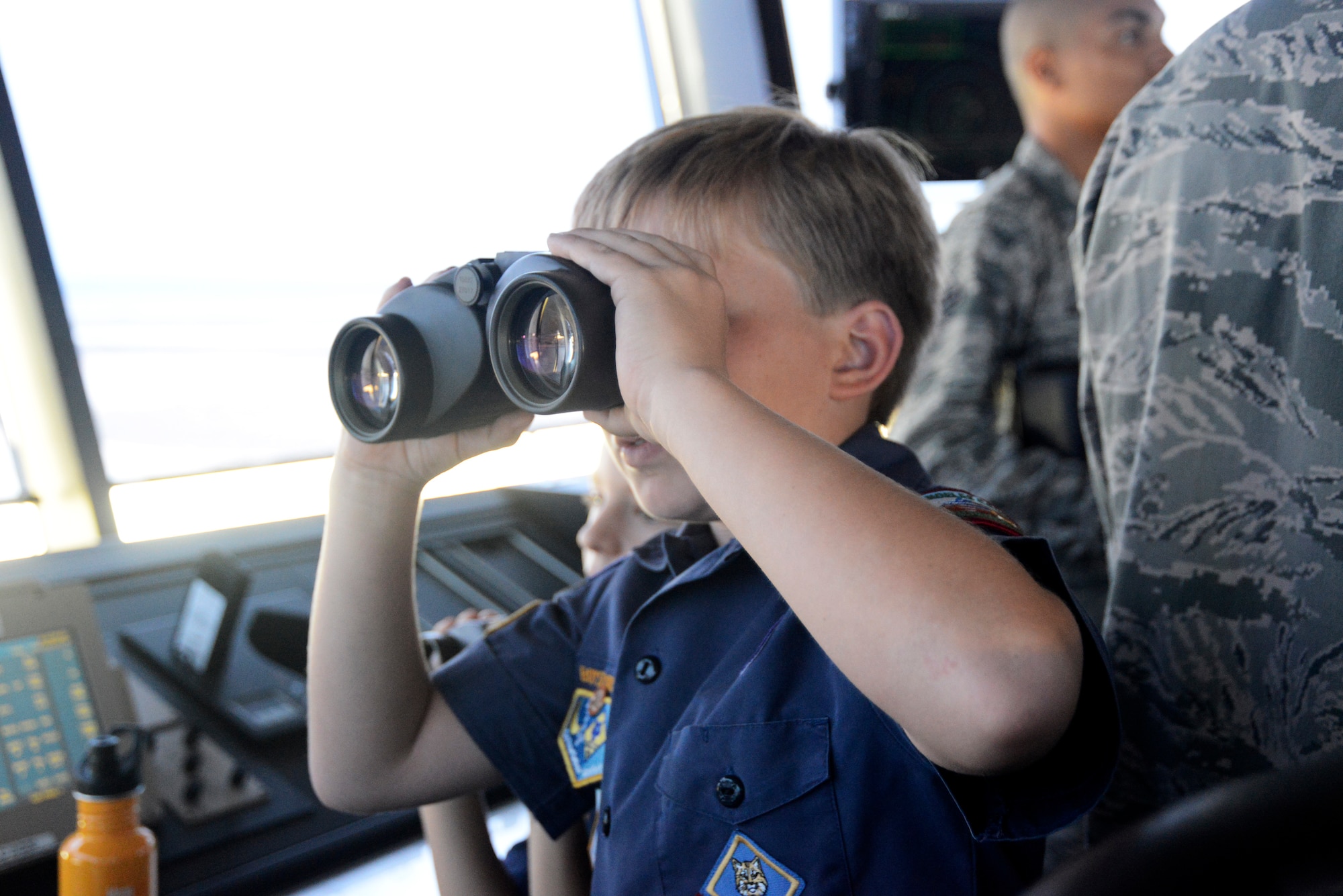 A Cub Scout enjoys the view from the Edwards control tower July 26 during a tour facilitated by the 31st Test and Evaluation Squadron. (U.S. Air Force photo by Rebecca Amber)