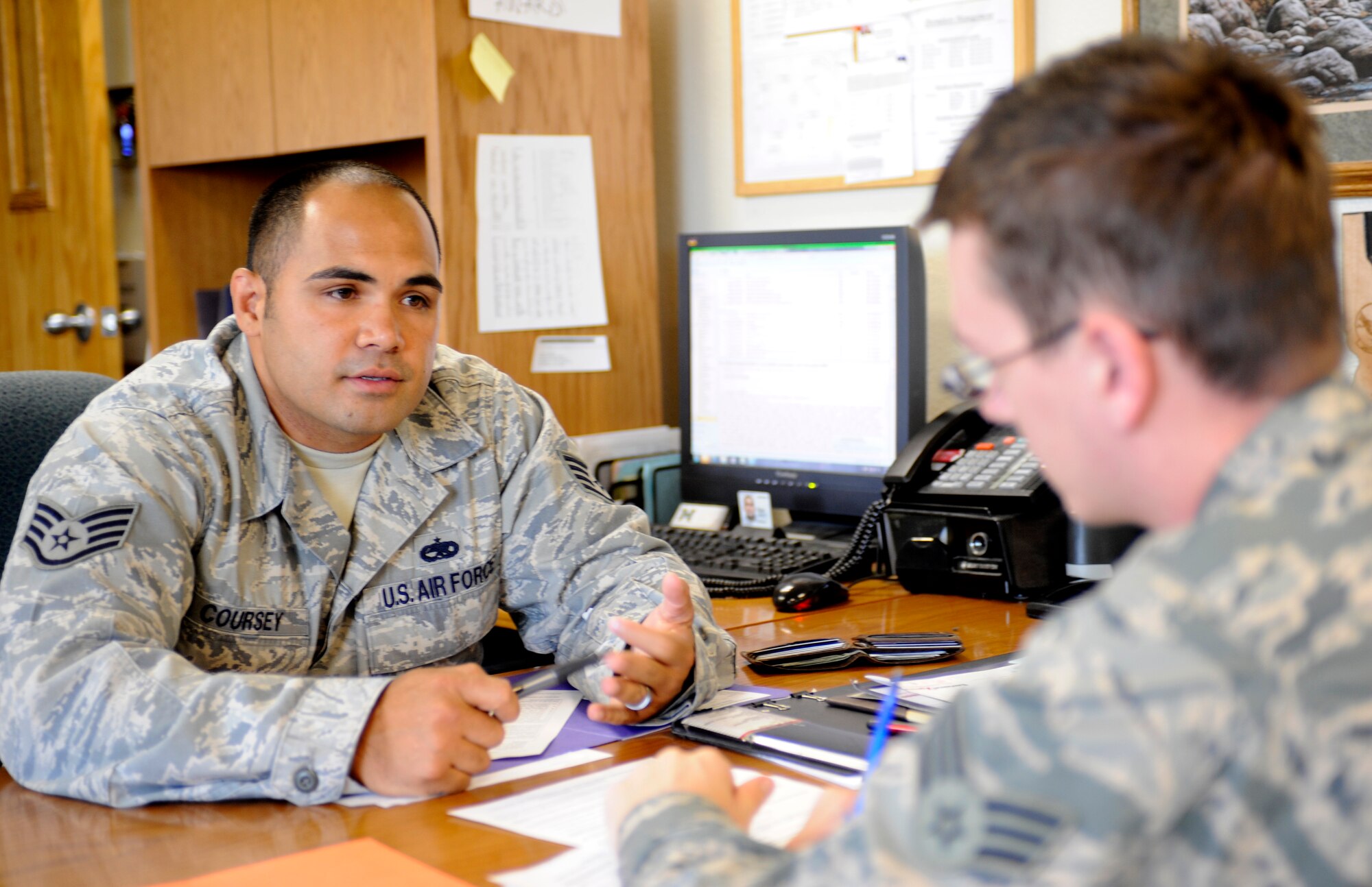 U.S. Air Force Staff Sgt. Jason Coursey, 366th Civil Engineering Squadron Airman dorm leader, helps an Airman transition into the dormitories, July 25, 2013, at Mountain Home Air Force Base, Idaho. With six dormitories, Coursey and his fellow ADLs are responsible for nearly 600 residents. (U.S. Air Force photo by Airman 1st Class Shane M. Phipps/Released)

