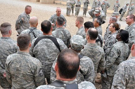 Command Sgt. Maj. David Hudson, senior enlisted leader of the National Guard Bureau, speaks with the National Guard's Citizen-Soldiers and -Airmen serving at Balad Air Base, Iraq, March 1. Hudson and Gen. Craig R. McKinley, chief of the National Guard Bureau, visited Citizen-Soldiers and -Airmen serving in Afghanistan, Iraq and Kuwait Feb. 28 - March 4.