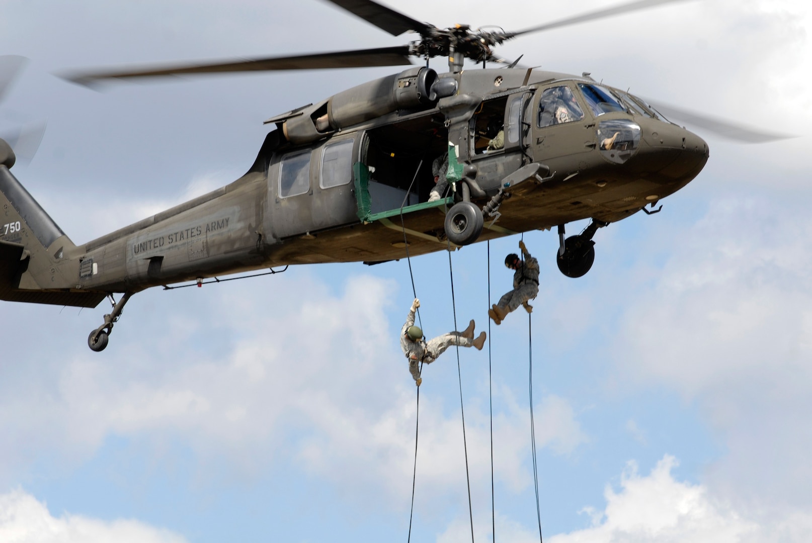 Soldiers rappel from a UH-60 Black Hawk helicopter during the Air Assault Course at Camp Blanding Joint Training Center, Fla., March 5, 2009.