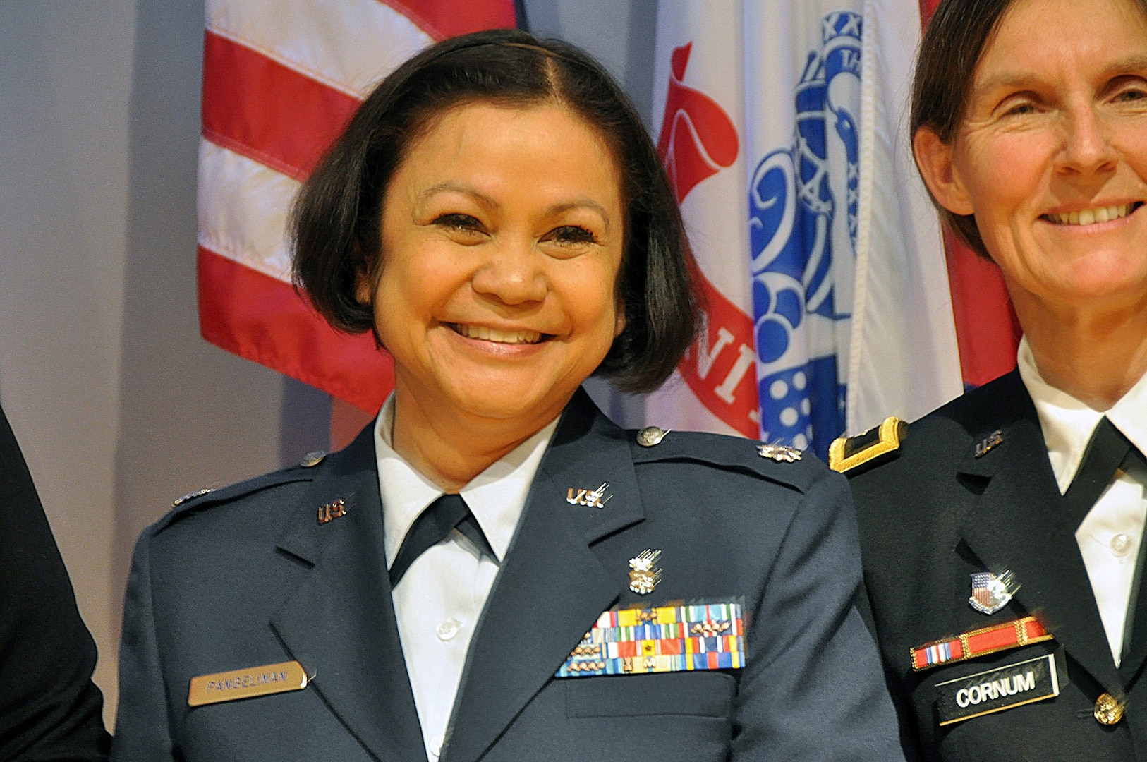 Air Force Lt. Col. Susan Pangelinan from the California National Guard is awarded a DoD Science, Technology, Engineering and Math (STEM) award March 19 at the Women in Military Service for America (WIMSA) Memorial, Arlington, Va., for her accomplishments as a medical advisor to the California Guard's Joint Force Headquarters. The awards ceremony honored 10 servicemembers who have worked toward the development of women and minorities in foreign languages and the STEM fields. It coincides with many other programs, ceremonies and activities that are observing women's history this month.