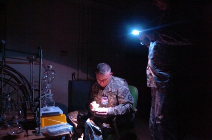 Sgt. David Reeves, a survey team member with the 35th Civil Support Team, West Virginia National Guard, sets up a chemical lab as part of Operation Vigilant Guard, Tuesday, March 24, 2009, near Ponce, Puerto Rico. Reeves and other members of the 35th CST set up the lab as part of a scenario in which terrorists have acquired weapons of mass destruction, and CSTs from Puerto Rico and the Virgin Islands help civil authorities negate the threat.