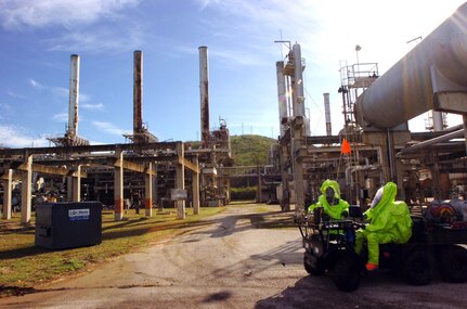 Members of the 23rd Civil Support Team (Weapons of Mass Destruction), Virgin Islands National Guard, reconnoiter an oil refinery suspected of housing weapons of mass destruction during Exercise Vigilant Guard March 24, 2009, near Ponce, Puerto Rico. Vigilant Guard tests the cooperation between civil and military authorities in a crisis.