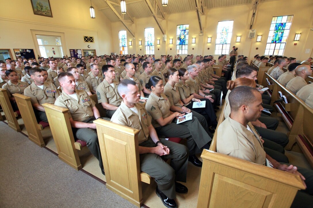 Marines, friends and family attend the memorial service for Gunnery Sgt. Konstantin Klyaz from 1st Intelligence Battalion, at the 11 Area Chapel at Camp Pendleton, Calif., July 26.