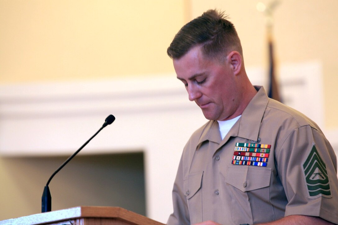 Master Sgt. Joseph Forton, with 1st Intelligence Battalion, speaks at the memorial service of his friend, Gunnery Sgt. Konstantin Klyaz at the 11 Area Chapel at Camp Pendleton, Calif., July 26. Forton and Klyaz served together aboard the USS Bonhomme Richard in 2001 and remained close friends since.