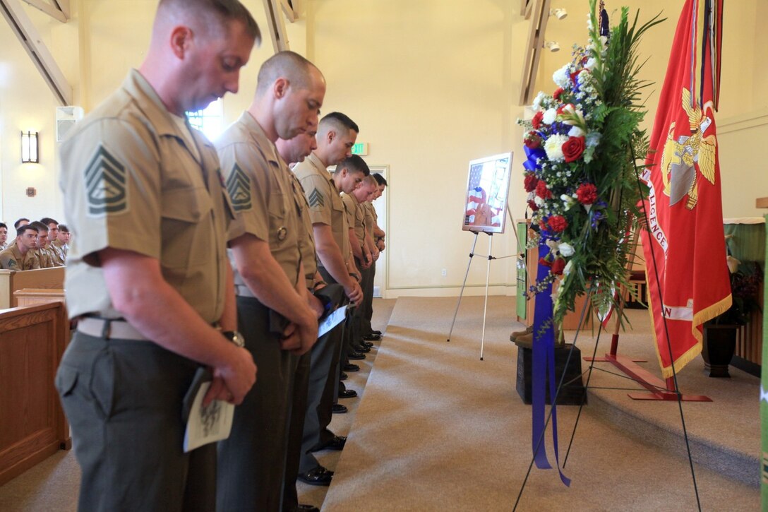 Marines pay their respects to Gunnery Sgt. Konstantin Klyaz, with 1st Intelligence Battalion, at the 11 Area Chapel at Camp Pendleton, Calif., July 26.