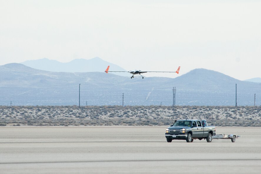 The X-56A Multi-Utility Technology Testbed comes in on final approach to landing July 26 at Edwards AFB, Calif.  Powered by twin JetCat P400 turbojets, the X-56A has a 28-foot wing span and weighs 480 pounds.  (NASA photo by Kenneth E. Ulbrich)