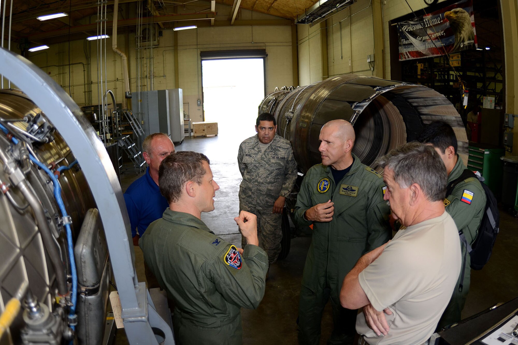 Colombian Brig. General Ramses Rueda, a pilot and Director of the Colombian Air Force Officer’s Academy, along with a team of Colombian Air Force officers, tour McEntire Joint National Guard Base, S.C., July 30, 2013. The visit was the latest engagement for the State Partnership Program between South Carolina and the Republic of Colombia. The Colombian Air Force has an interest in purchasing their own F-16’s in the near future and visited the South Carolina Air National Guard to gain knowledge of the maintenance and logistics facilities that support the aircraft.   (U.S. Air National Guard photo by Tech. Sgt. Caycee Watson/Released)