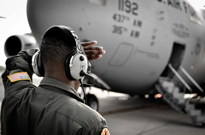 Airman 1st Class Trae Williams, 16th Airlift Squadron loadmaster, inspects the engines of a C-17 Globemaster III as pilots perform pre-flight engine checks July, 30, 2013, at Joint Base Charleston– Air Base, S.C. (U.S. Air Force photo/Airman 1st Class Michael Reeves)