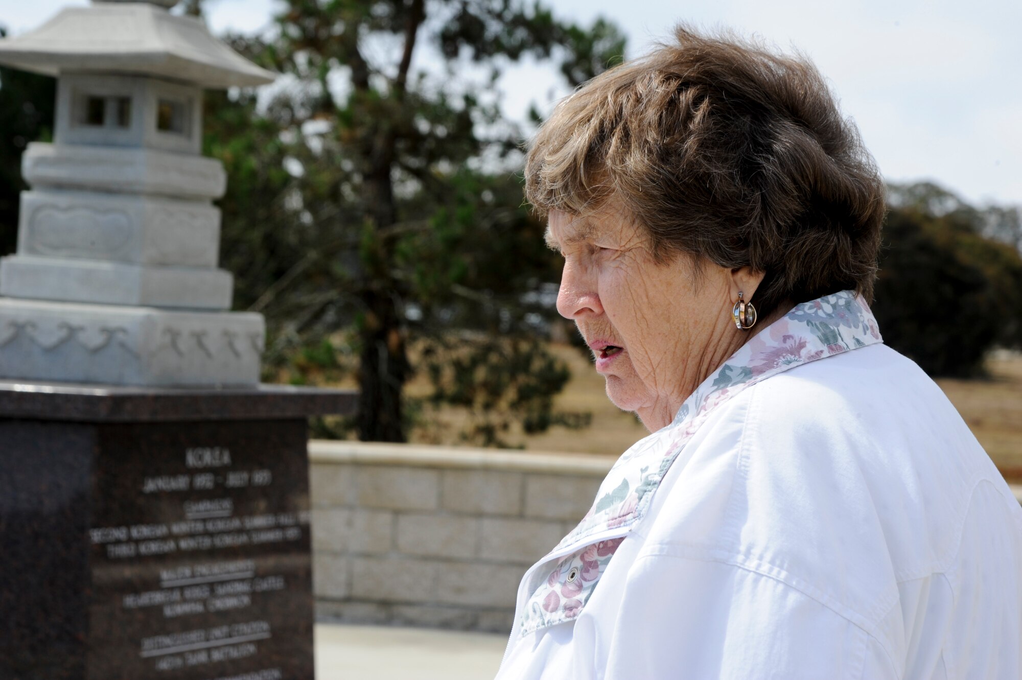 VANDENBERG AIR FORCE BASE, Calif. – Ruby Cacy, widow of U.S. Army former Staff Sgt. Kenneth Cacy’s of the 40th Infantry Division of the California National Guard, reminisces at the Korean War Memorial here Thursday, July 25, 2013. July 27, 1953 marked the end of the Korean conflict, it has been almost 60 years since Ruby stepped foot onto Vandenberg Air Force Base, which was still operating as Camp Cook when she and her husband were previously stationed here. (U.S. Air Force photo / Senior Airman Lael Huss)