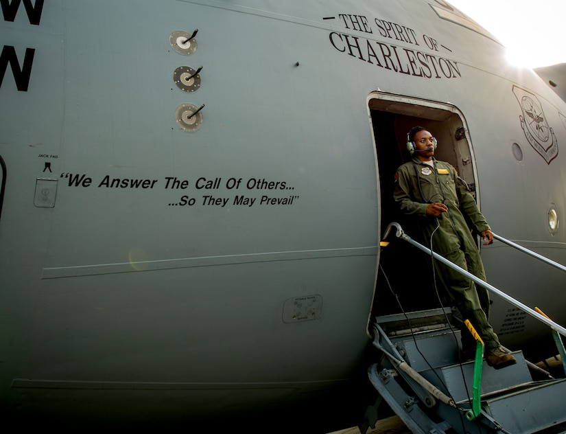 Airman 1st Class Trae Williams, 16th Airlift Squadron loadmaster, exits a C-17 Globemaster III July 30, 2013, at Joint Base Charleston – Air Base. S.C. (U.S. Air Force photo/ Senior Airman Dennis Sloan)