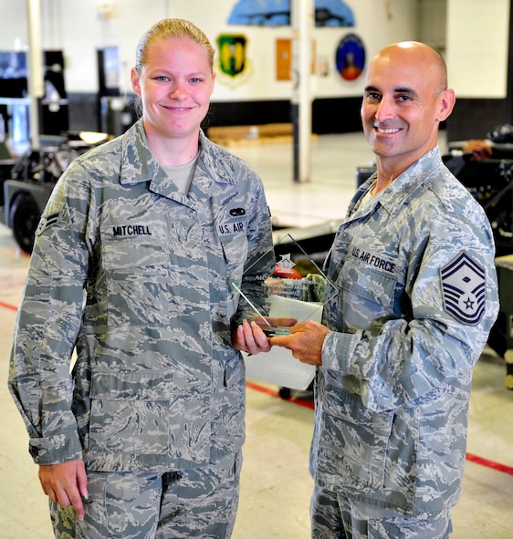 Airman 1st Class Megan Mitchell, assigned to the 5th Maintenance Squadron, earned the Diamond Sharp Award, July 24, 2013. Mitchell is currently a Dorm Resident Advisor. She earned the award for doing an outstanding job taking care of the Airmen in her dorm. She is always on top of dorm issues helping enforce dormitory standards. Mitchell has gone above and beyond keeping the first sergeants aware of concerns including quality of life matters. She has been in integral part of keeping morale high for the members who live in Dorm 276 and she has proven to be a great leader the first sergeants can count on. (U.S. Air Force photo/Airman 1st Class Kristoffer Kaubisch)