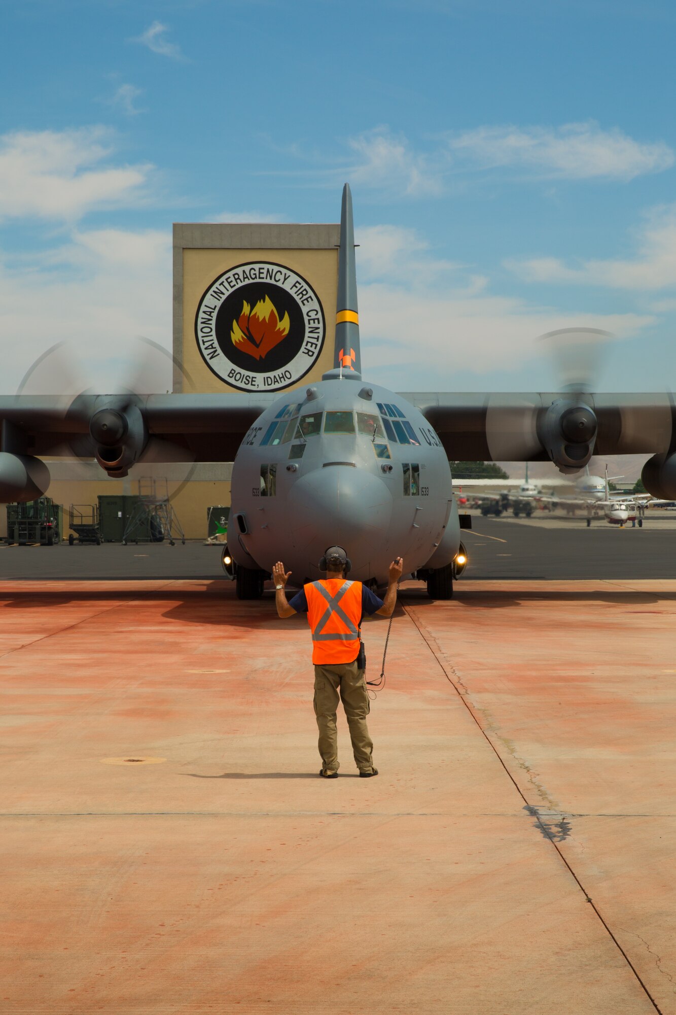 A Modular Airborne Fire Fighting System-equpped C-130 from the 153rd Airlift Wing prepares to take off in Boise, Idaho on July 28, 2013. Wyoming and North Carolina Air National Guard units are currently based at Boise in support of MAFFS missions. (U.S. Air National Guard photo by Tech. Sgt. Jeffrey Allred)