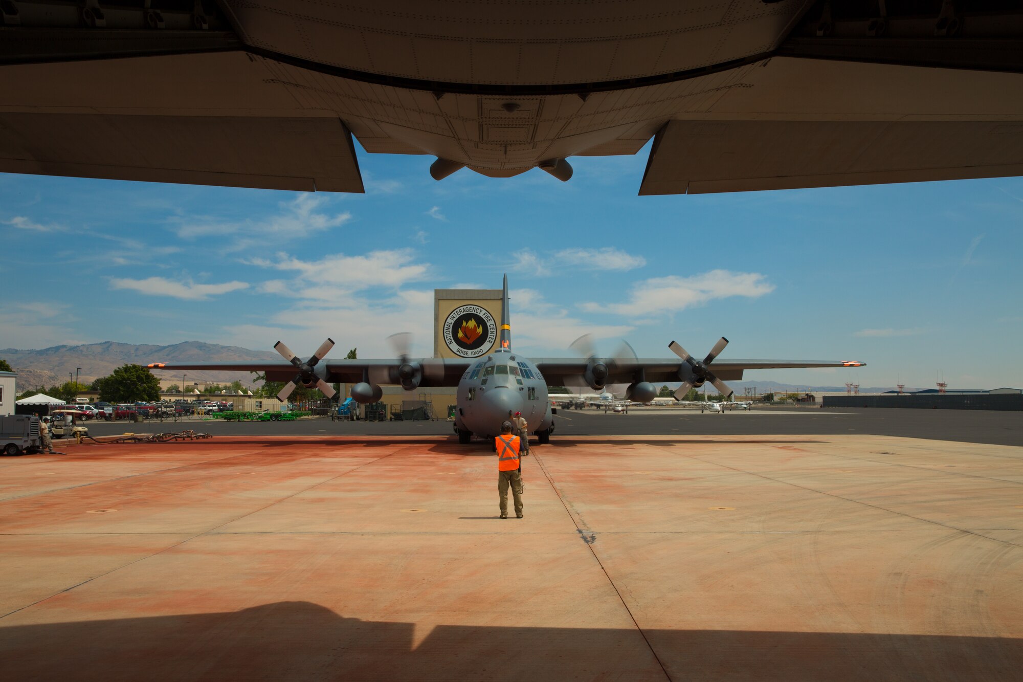 A Modular Airborne Fire Fighting System-equpped C-130 from the 153rd Airlift Wing prepares to take off in Boise, Idaho on July 28, 2013. Wyoming and North Carolina Air National Guard units are currently based at Boise in support of MAFFS missions. (U.S. Air National Guard photo by Tech. Sgt. Jeffrey Allred)